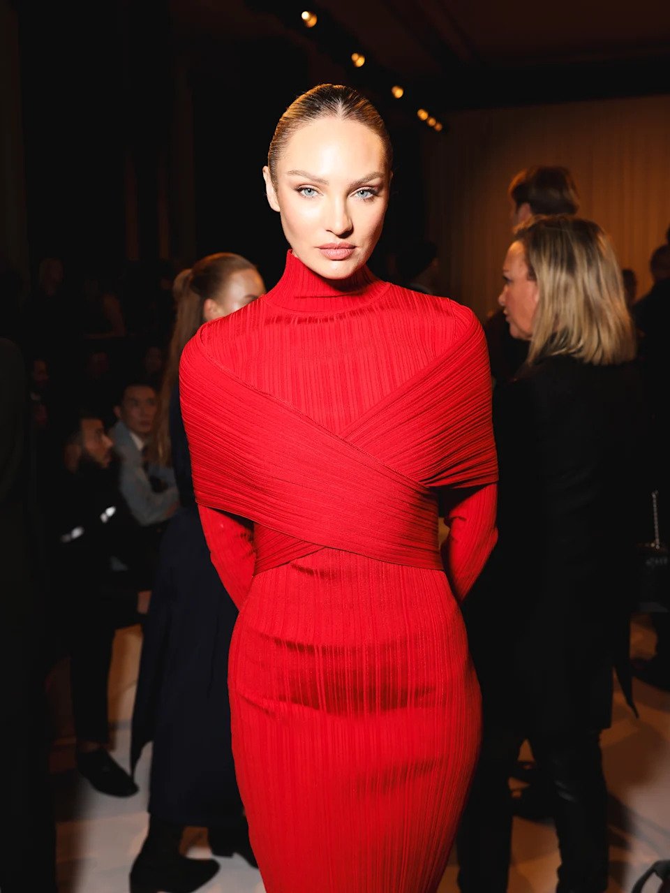 Reports surfaced over the weekend that Swanepoel (seen above in a red dress) was dating Tom Brady. Getty Images for Balmain Beauty